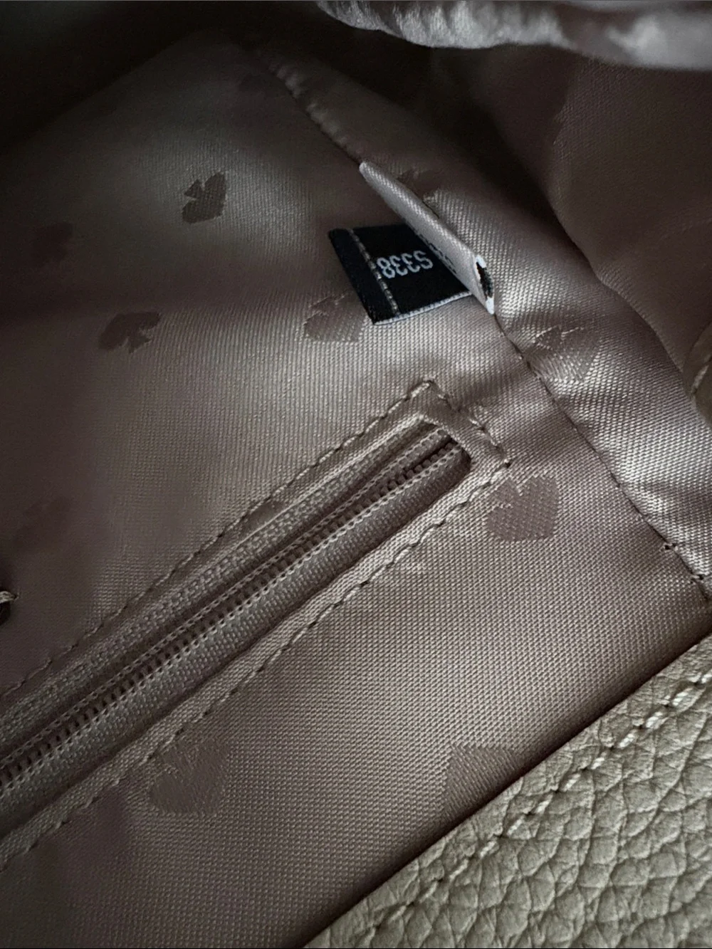 kate spade beige faux-shearling flap backpack